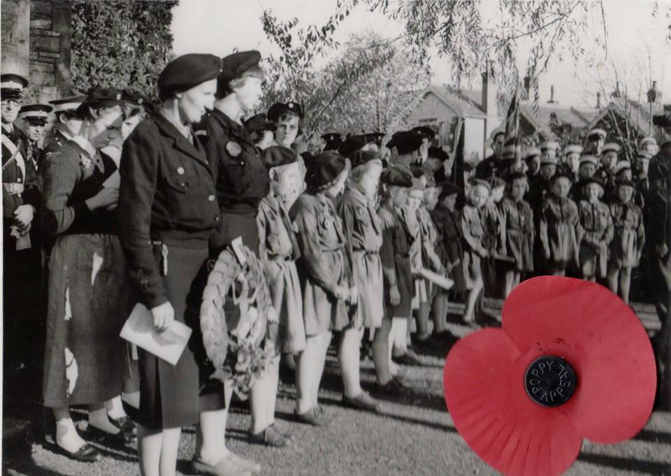 Remembrance Sunday 1955 showing Guides and Brownies. 